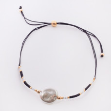 Bransoletka ze sztuczną perłą na sznureczku z koralikami Miyuki czarna