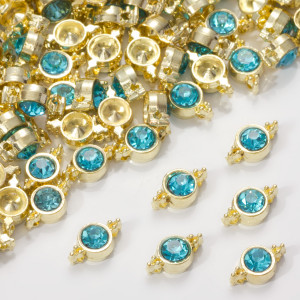 Przekładka z kryształkiem koloru złotego aquamarine 10mm